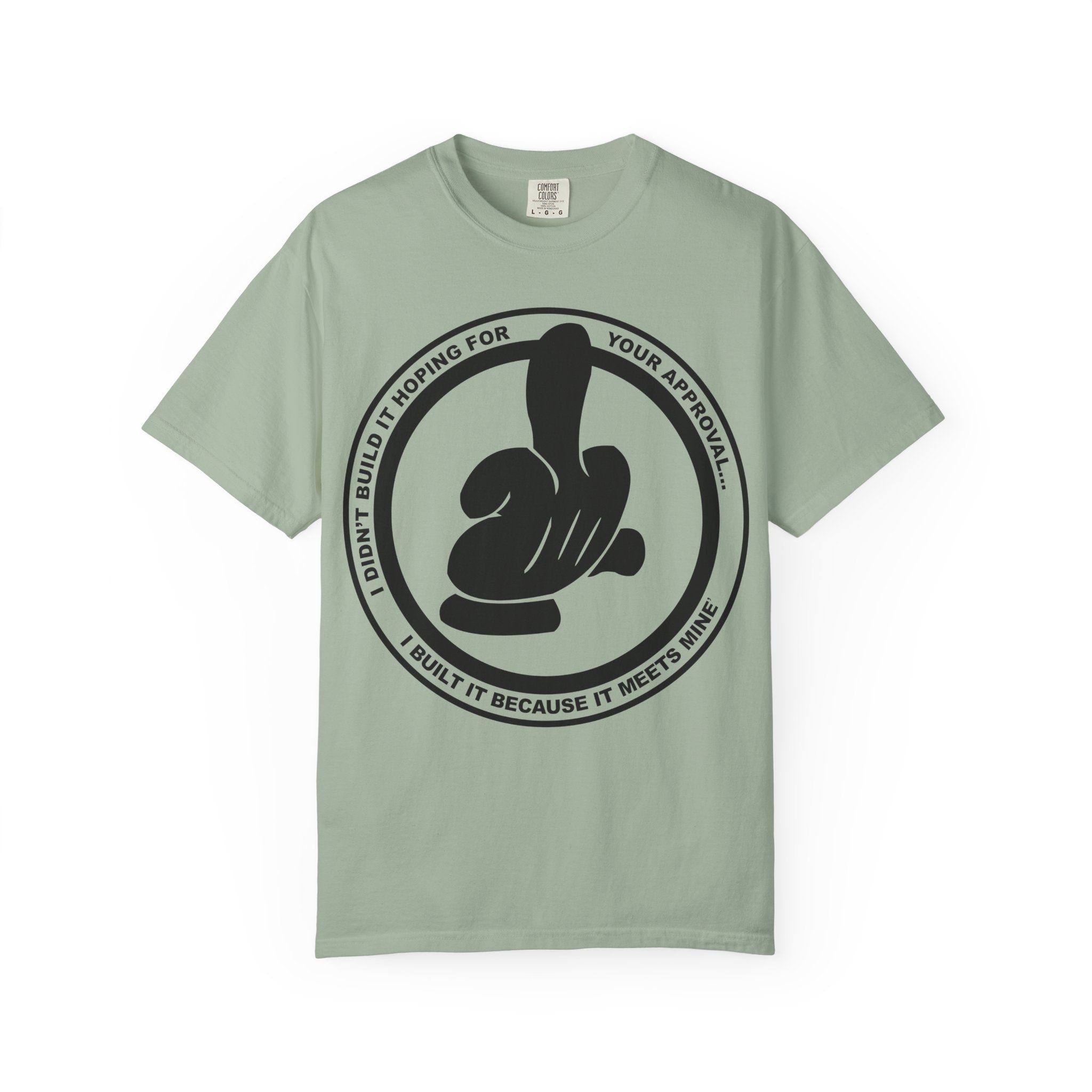 Graphic T-Shirt — Bold Logo Circle with Hand Gesture & Quote: "I Didn’t Build It Hoping For Your Approval; I Built It Because It Meets Mine"